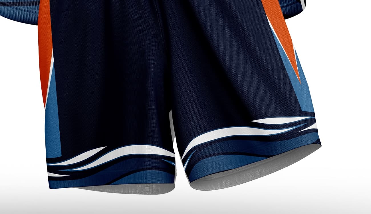 2026 match shorts — navy with light blue side panels and wave detail at the hem